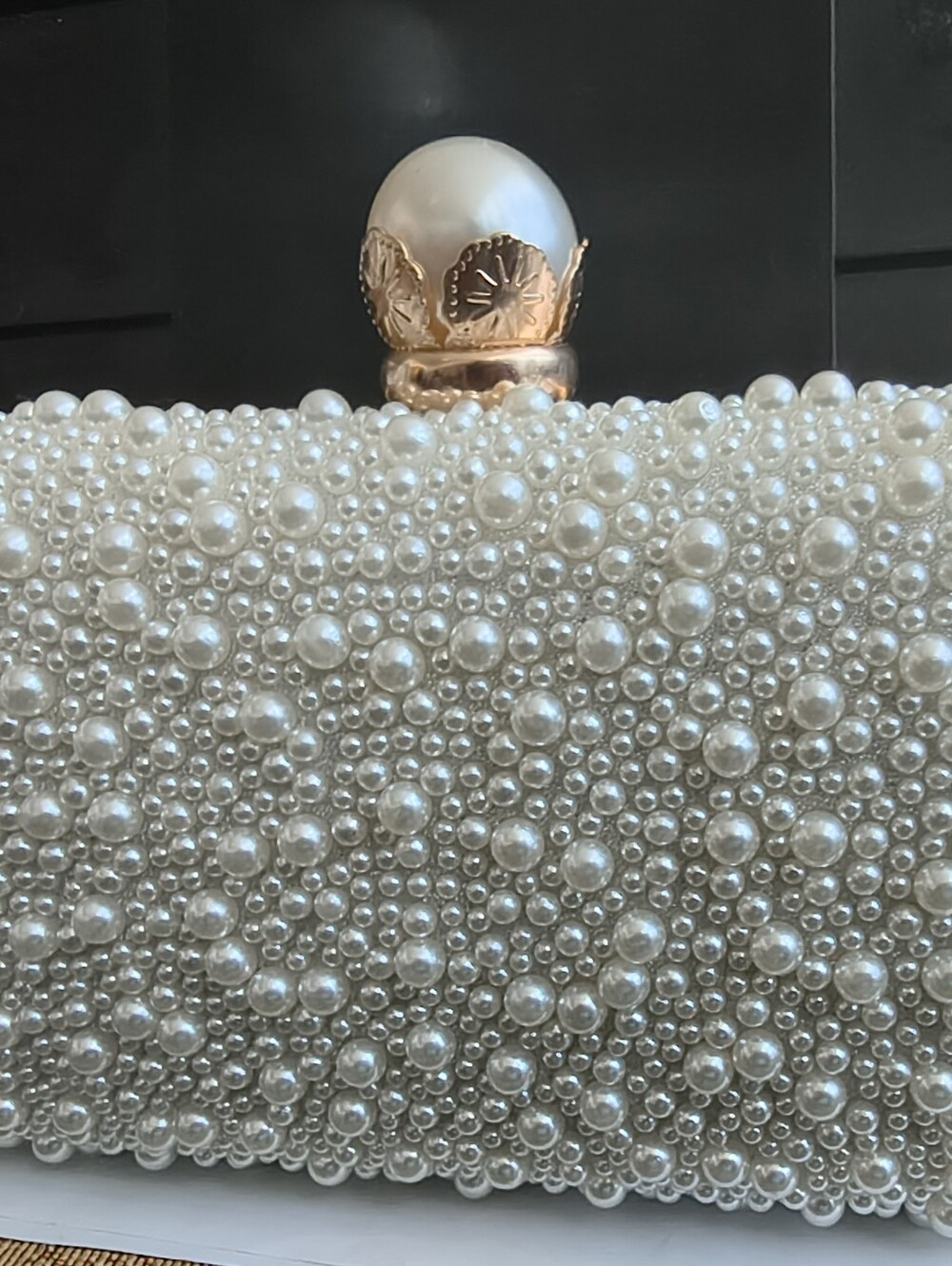 Elegant Pearl Clutch With Gold Details And Gold Back